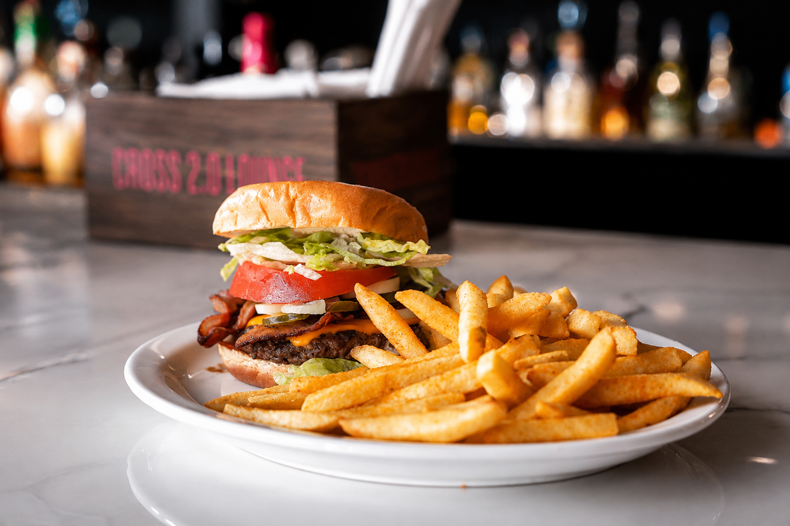 Cross Ultra Lounge Burger and fries